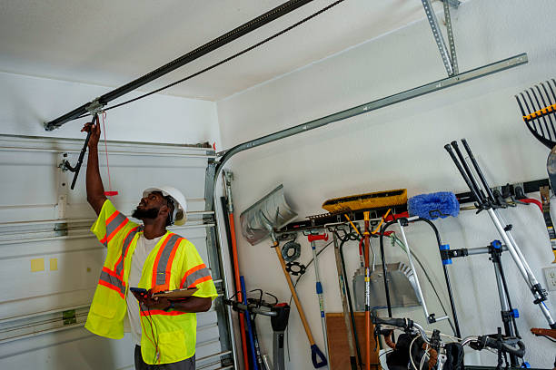 Professional Garage Door Panel Replacement technician working in North Tonawanda, NY